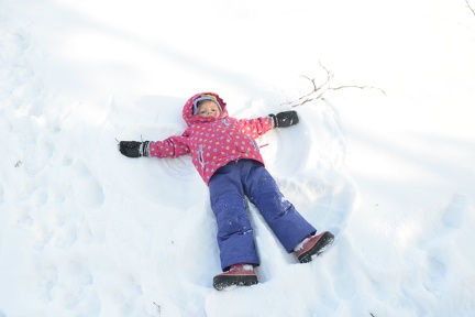 Greta making snow angels2